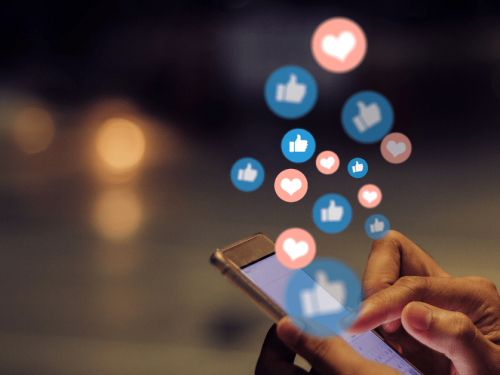 like and heart facebook icons popping off iphone screen